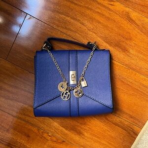 Elegant Blue Handbag with Gold Accents